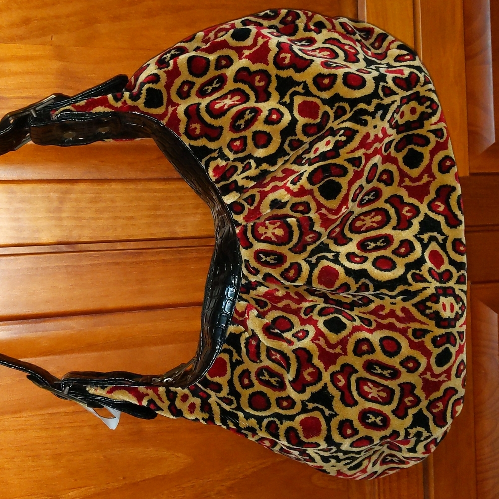 Coldwater creek hobo/bohemian style velveteen purse with metal accents.
